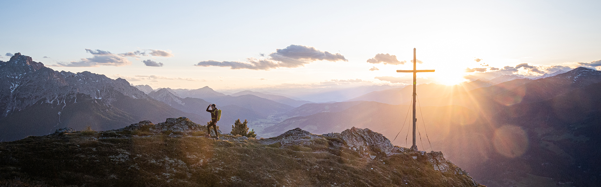 A man hiking with a headlamp