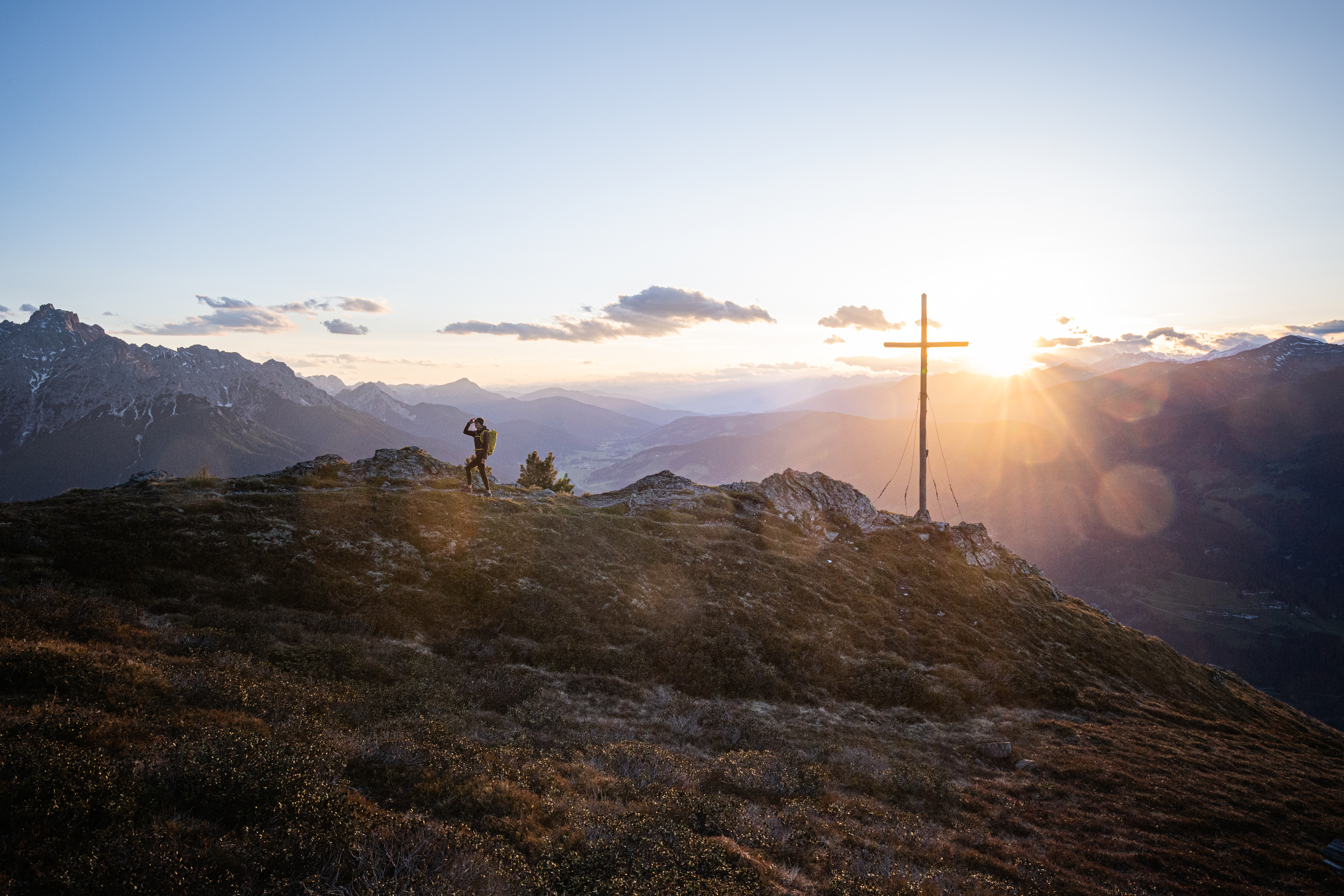 A woman on the top of a hill