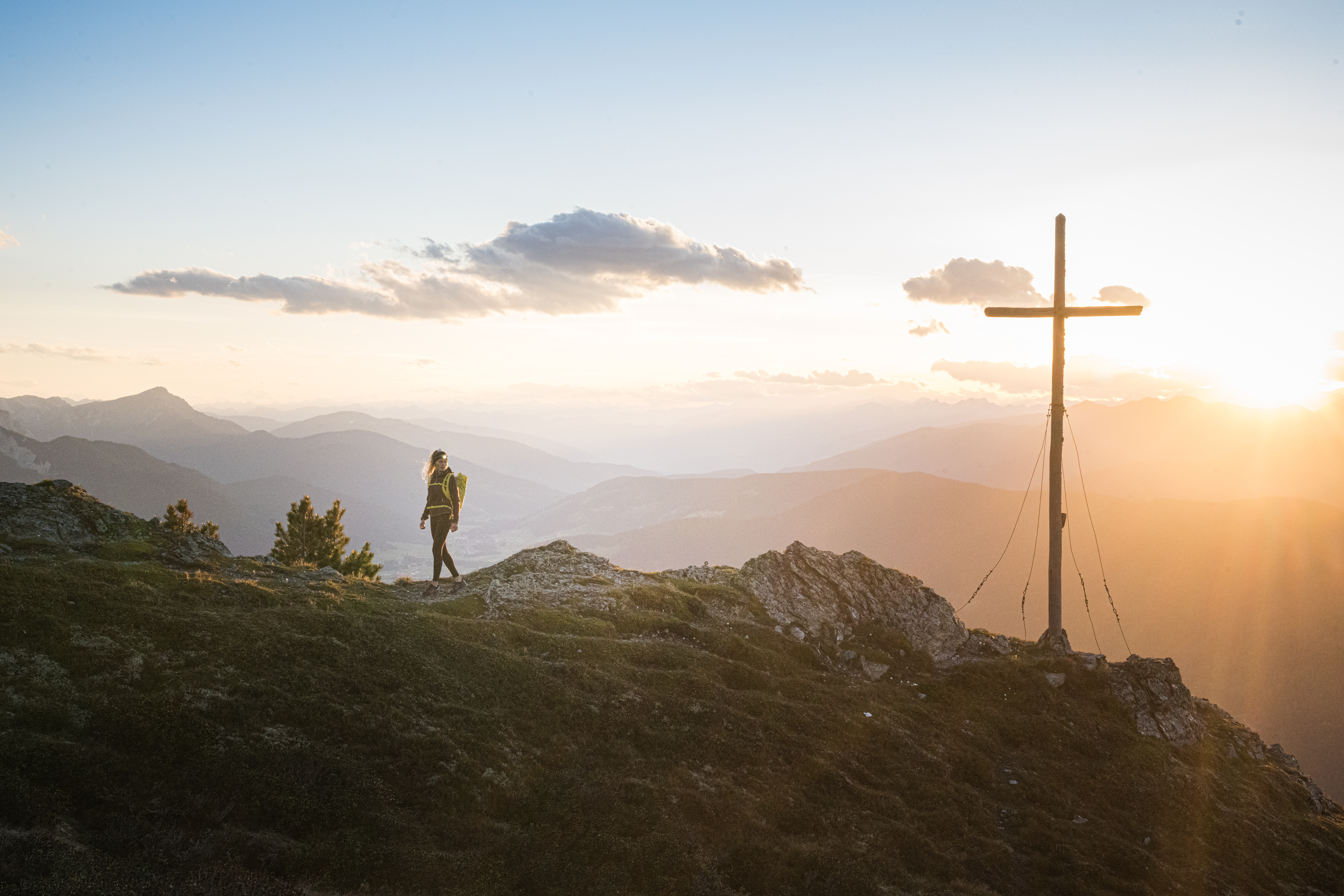 A woman on the top of a hill