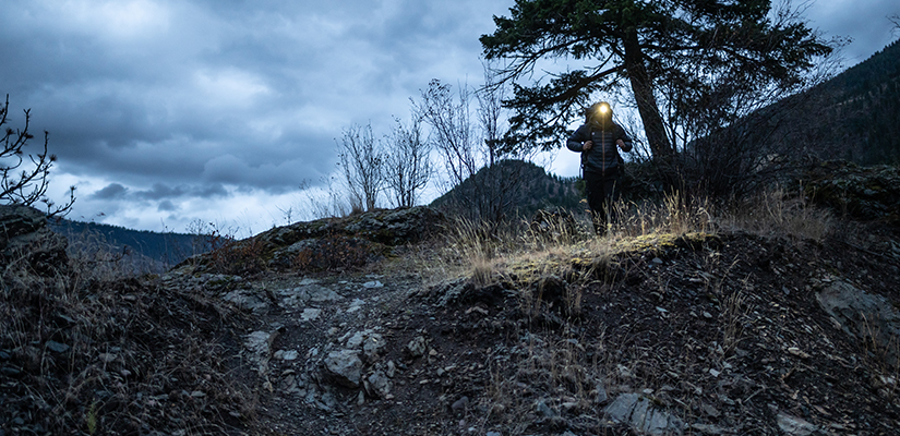 A jogger in the dark with a headlamp