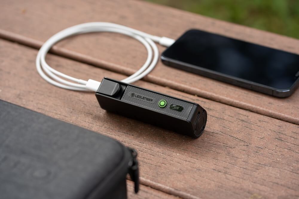 Ledlenser power bank connected to a smartphone